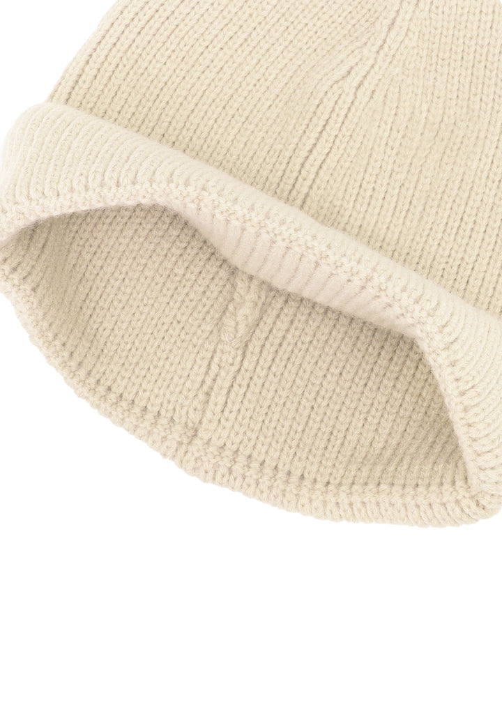 Cappello invernale donna con pon pon di colore beige