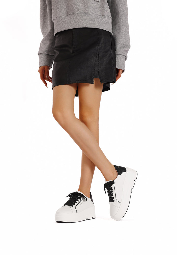 Sneakers da donna con platform colore bianco nero