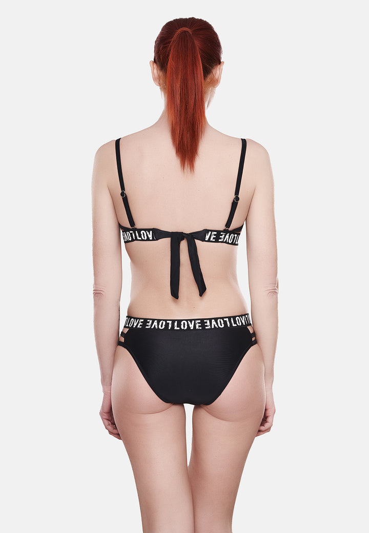 Costume da bagno bikini da donna colore nero imbottito con ferretto e con elastico e scritta "love"