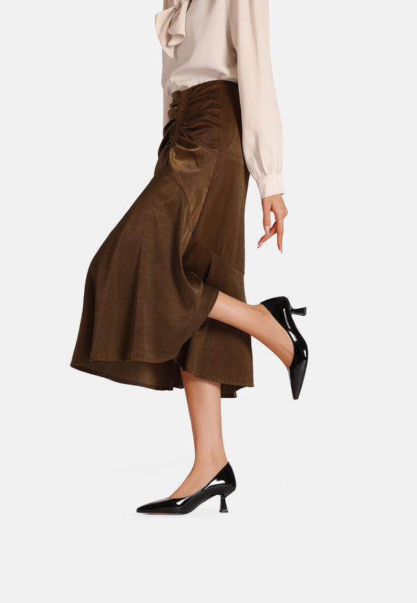 Décolleté donna a punta con tacco medio a clessidra, lucide