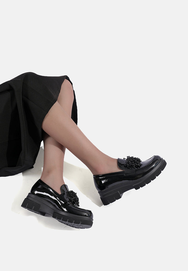 mocassini da donna lucidi colore nero con platform