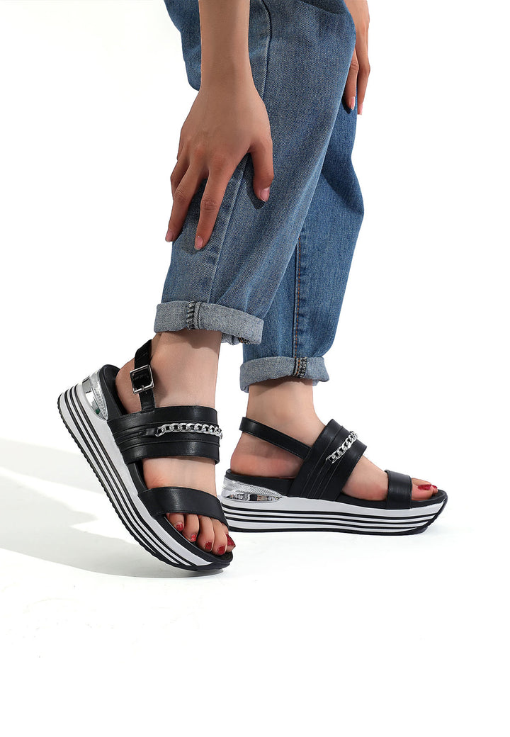 sandali da donna colore nero e dettagli argento con zeppa platform e cinturino alla caviglia