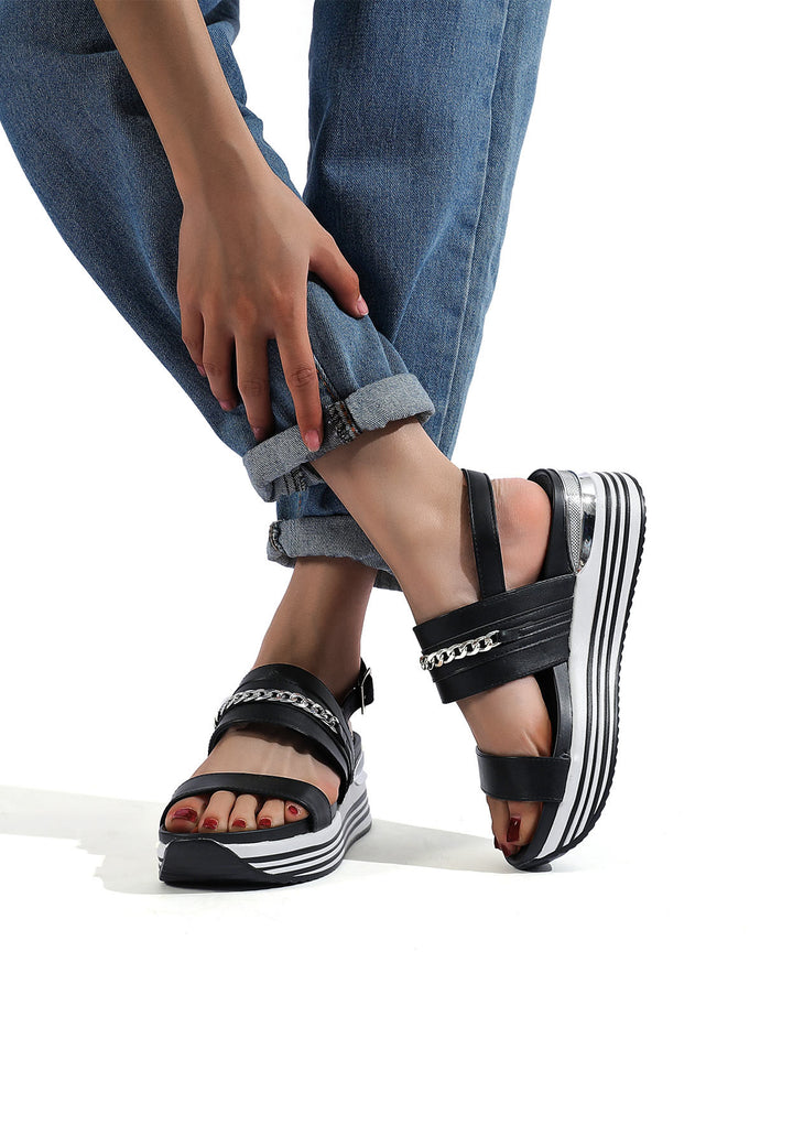 sandali da donna colore nero e dettagli argento con zeppa platform e cinturino alla caviglia