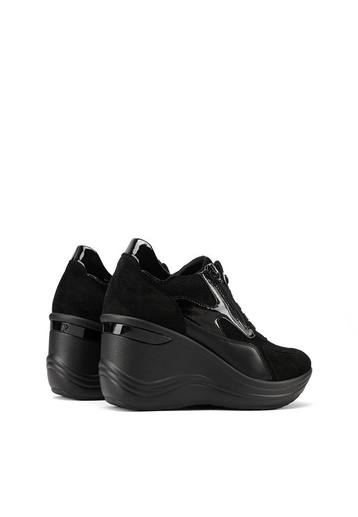 Sneakers da donna con zeppa alta, zip laterale e dettagli metallici