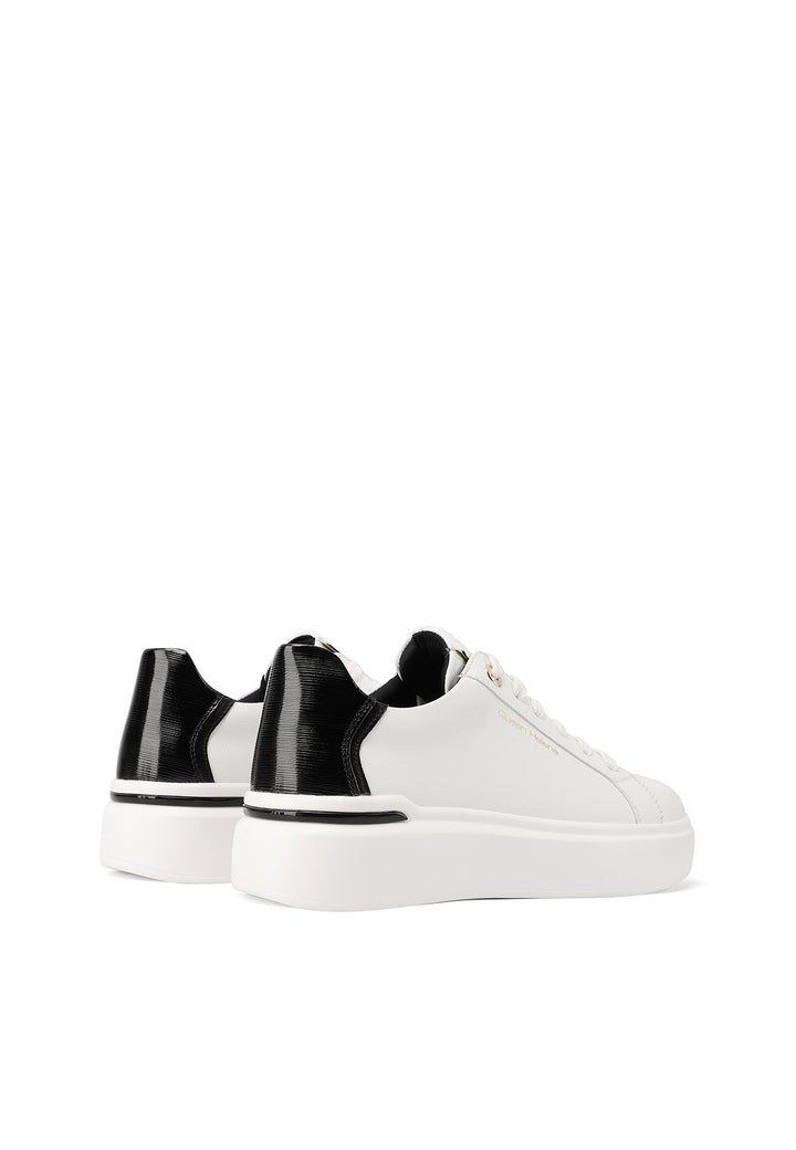 sneakers ecopelle bianca dettagli neri con suola alta platform e lacci