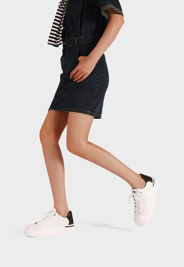 sneakers ecopelle bianca dettagli neri con suola alta platform e lacci