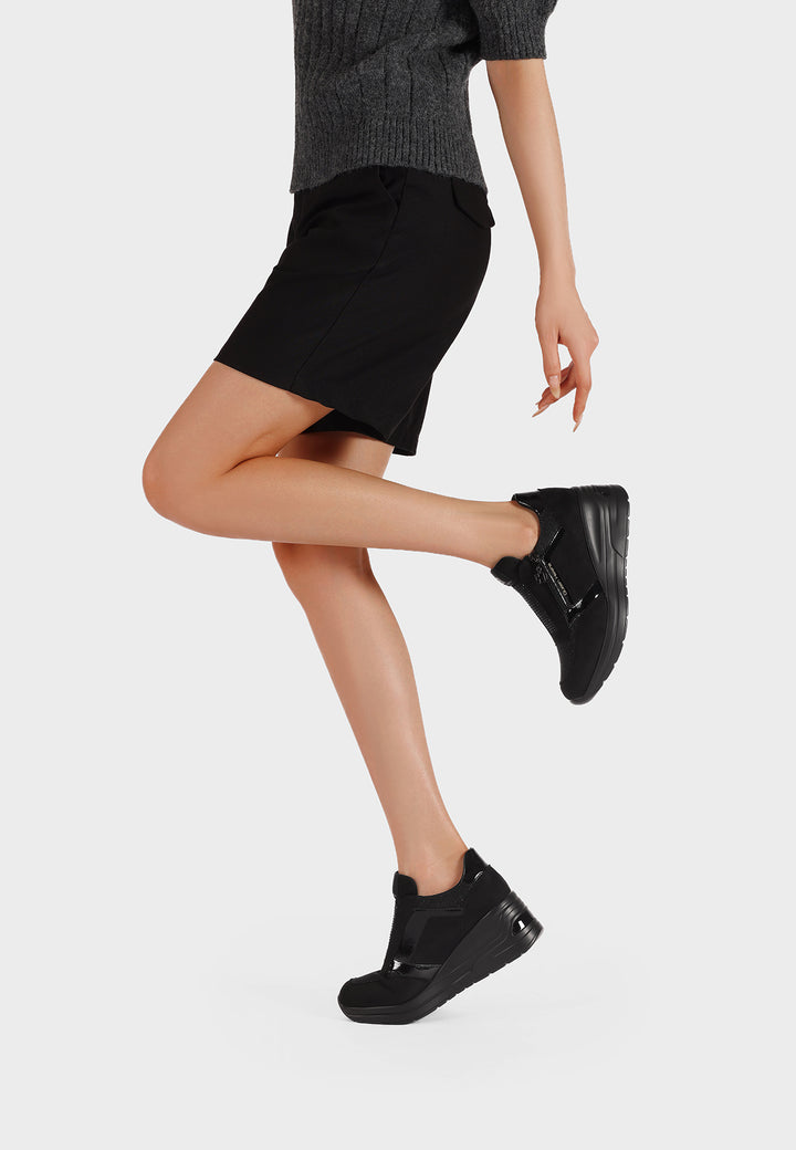 sneakers eleganti da donna nere con cerniera e tacco alto in gomma