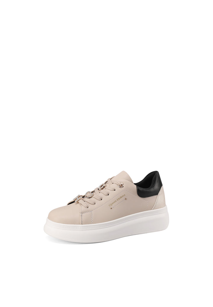 Sneakers beige con suola alta e lettere con strass incastrati sui lacci