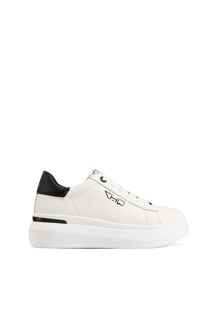 Sneakers stringate in vera pelle con suola alta colore bianco e nero