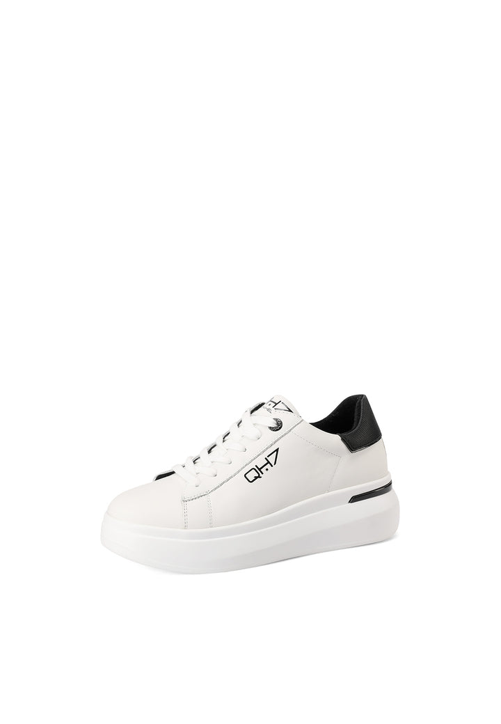 Sneakers stringate in vera pelle con suola alta colore bianco e nero