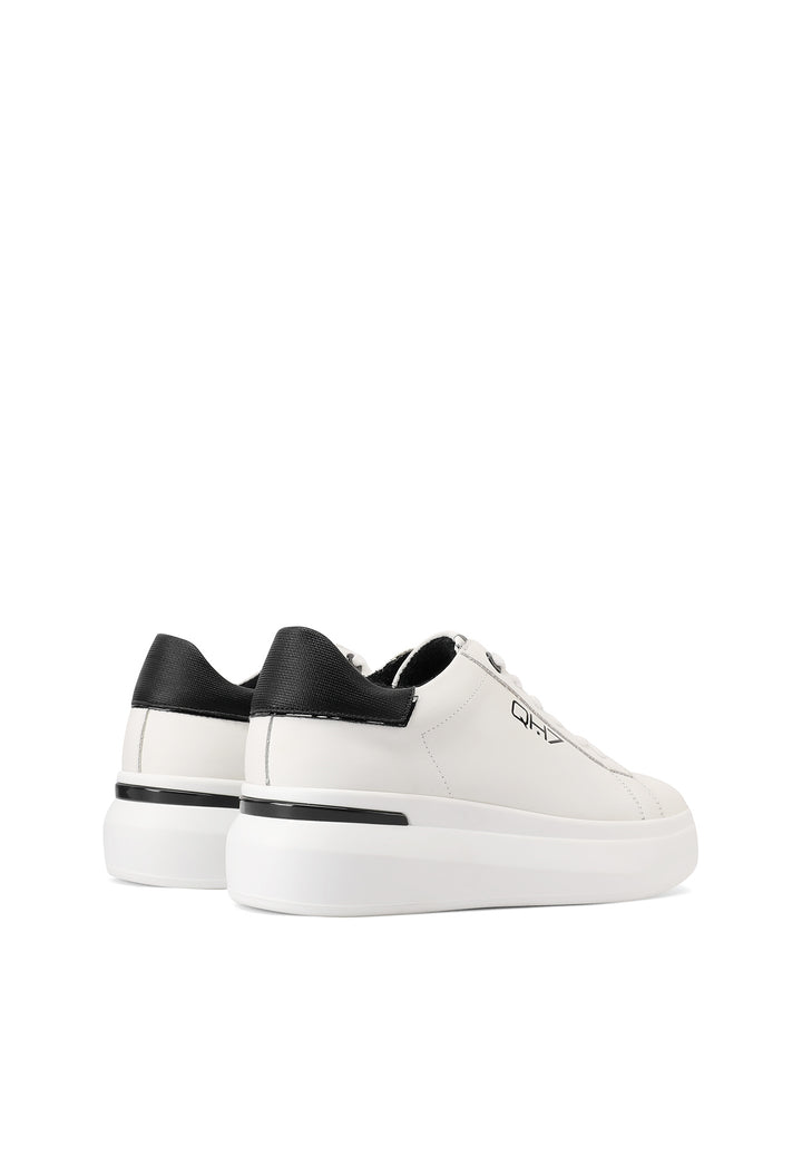 Sneakers stringate in vera pelle con suola alta colore bianco e nero