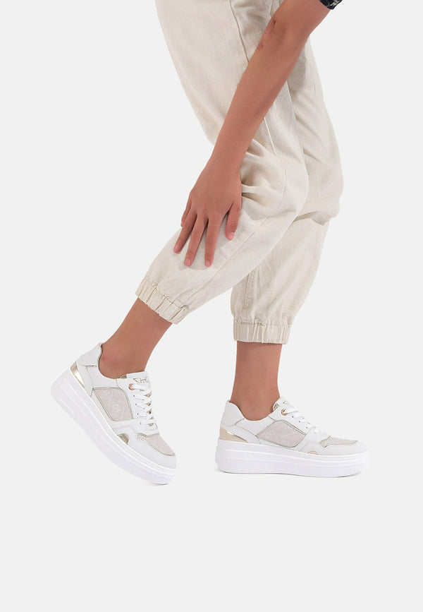 Sneakers stringate da donna in vera pelle con suola alta colore bianco