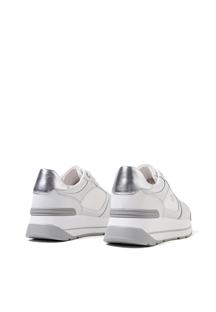 Sneakers in vera pelle con suola alta colore bianco